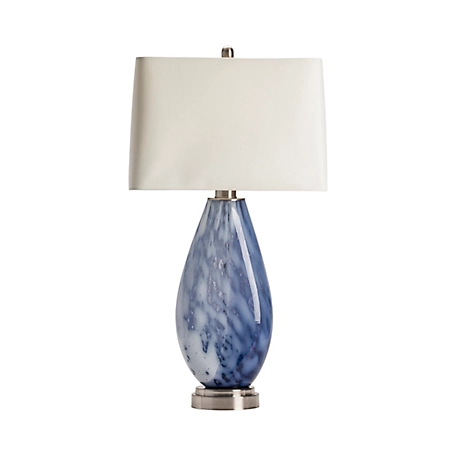 A blue and white glass table lamp.
