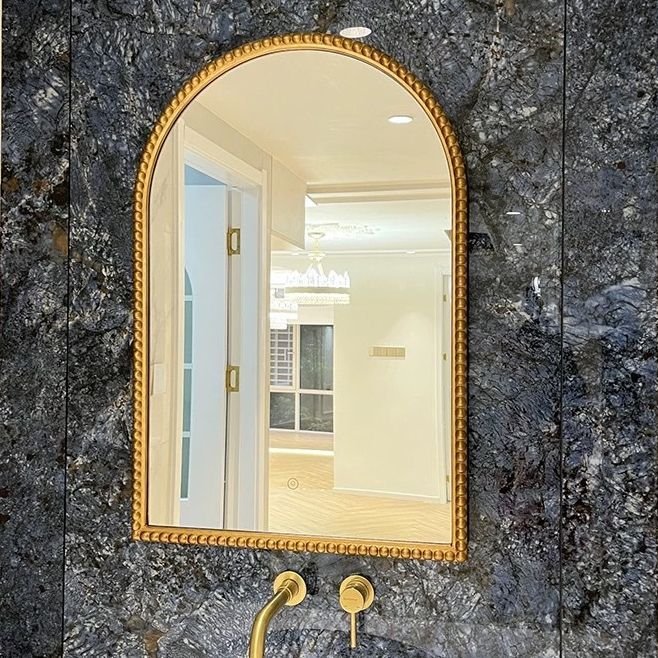 A vintage style mirror.